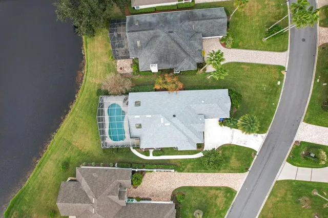 an aerial view of a house with a garden