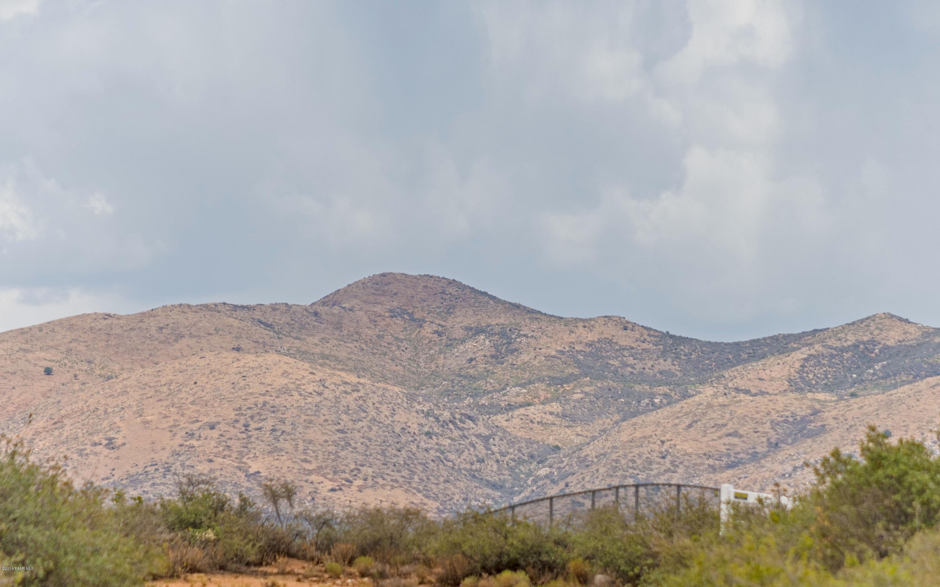 a view of mountains and valleys