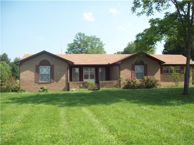 281 Doak Road Manchester, TN 37355 - Photo 1 of 20 281 DOAK RD. Court Yard leading to the Double Doors on Front of this 3 bedroom, 2 bath all brick home on large corner lot.