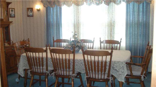 281 Doak Road Manchester, TN 37355 - Photo 11 of 20 Bright and Sunny, Dining Room that will easily accomodate full size dining table, china hutch, plus more. Also has ceiling fan and french doors, you can close off, when not in use
