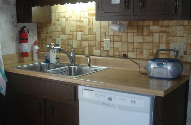 281 Doak Road Manchester, TN 37355 - Photo 16 of 20 New dishwasher that is located close to sinks for easy clean up.