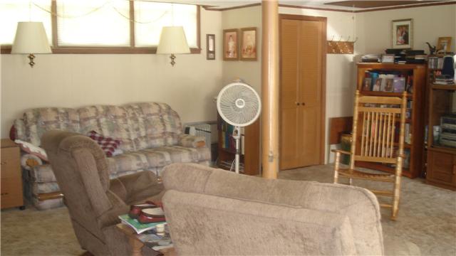 281 Doak Road Manchester, TN 37355 - Photo 19 of 20 Another view of Family Room and the closet that has Washer and Dryer. Lots of room for a game room.