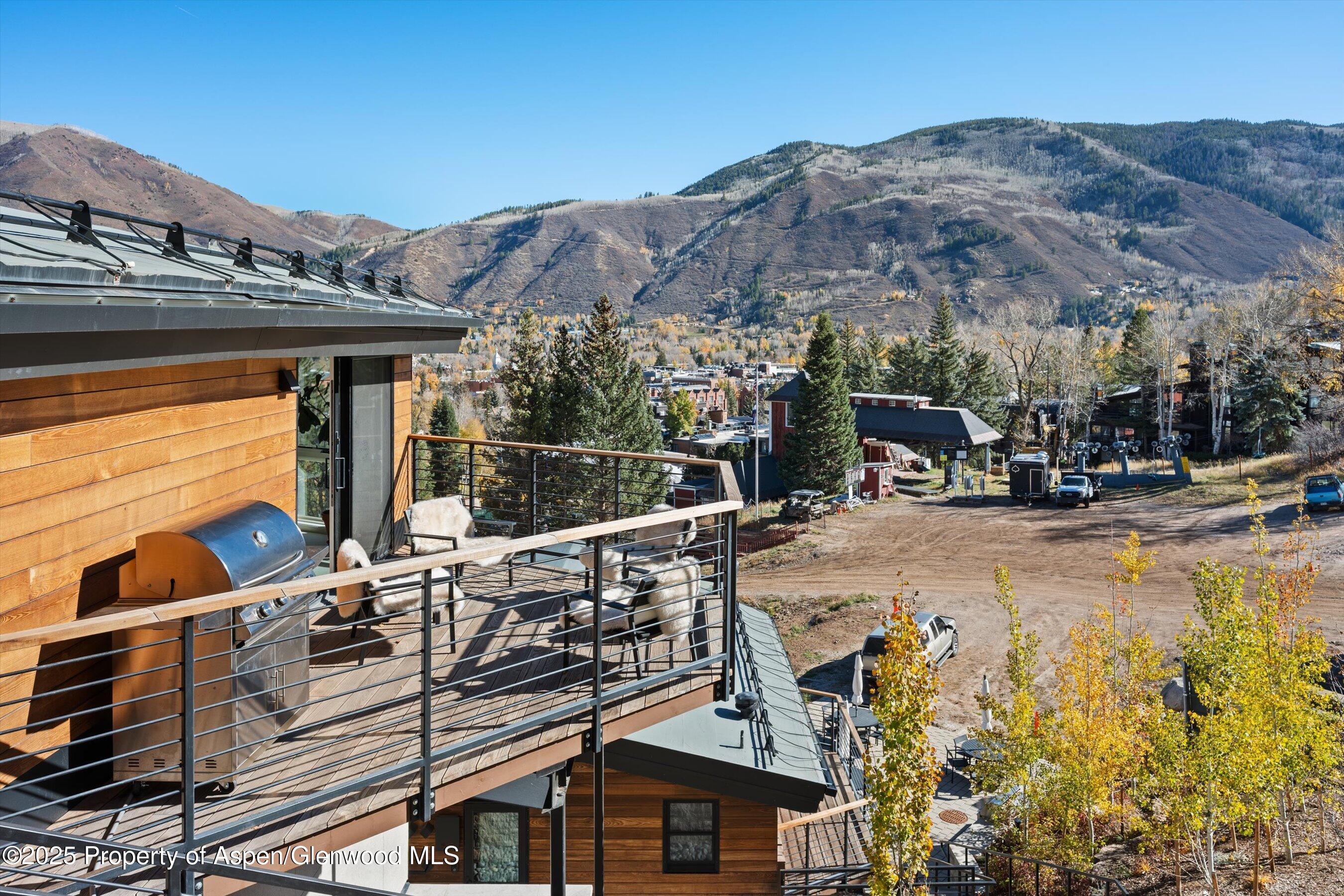 809 South Aspen Street, Unit 17 Aspen, CO 81611 - Photo 11 of 34 a view of outdoor space with seating area