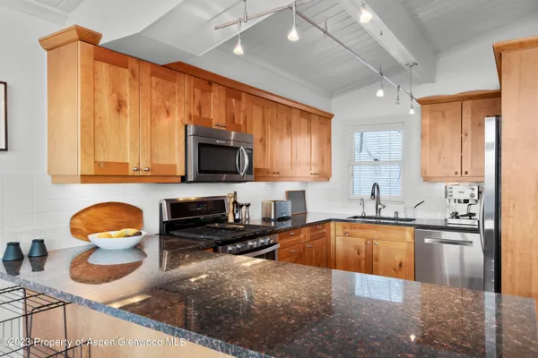 an aerial view of a house with a garden