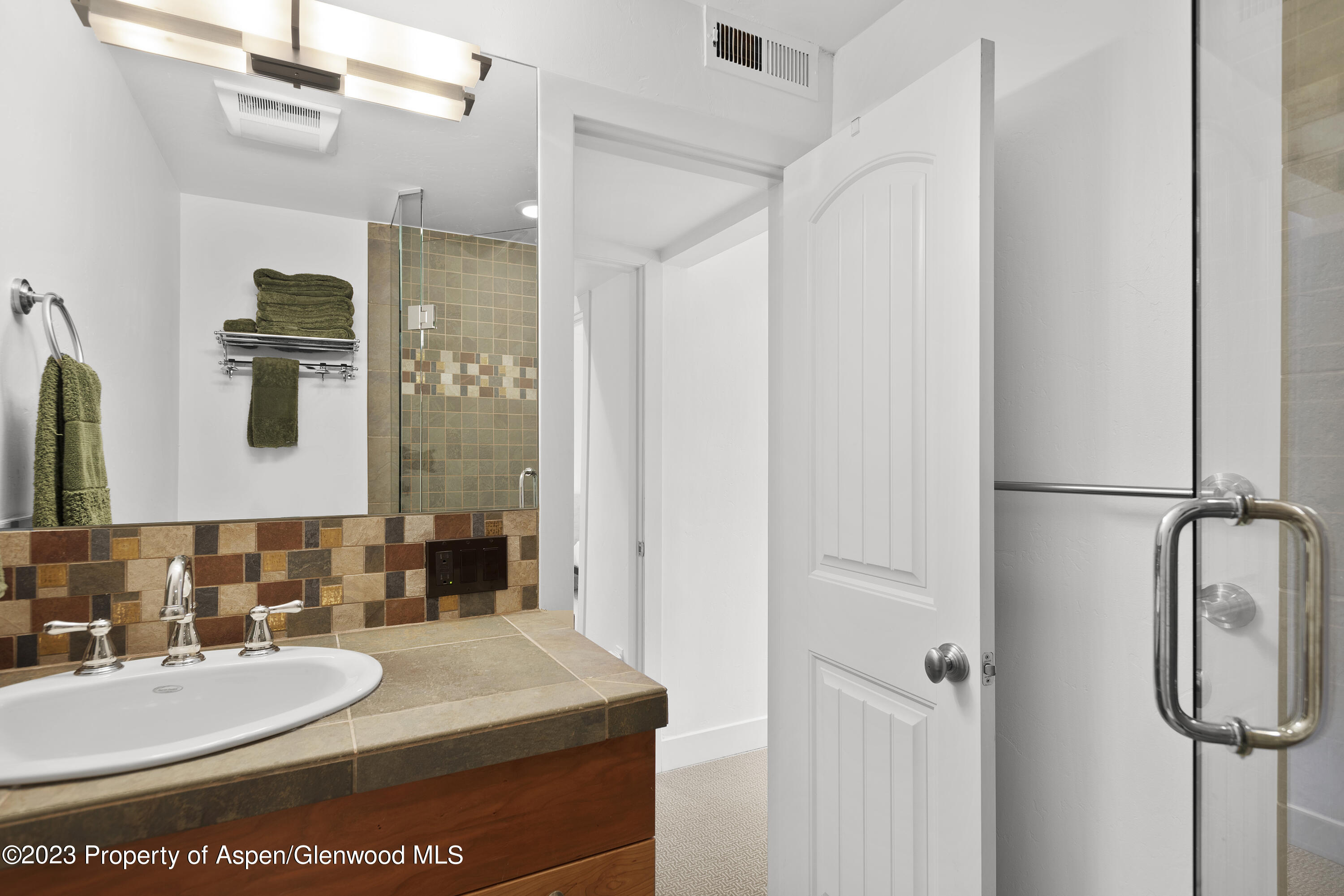 809 South Aspen Street, Unit 17 Aspen, CO 81611 - Photo 19 of 34 a bathroom with a sink toilet and shower