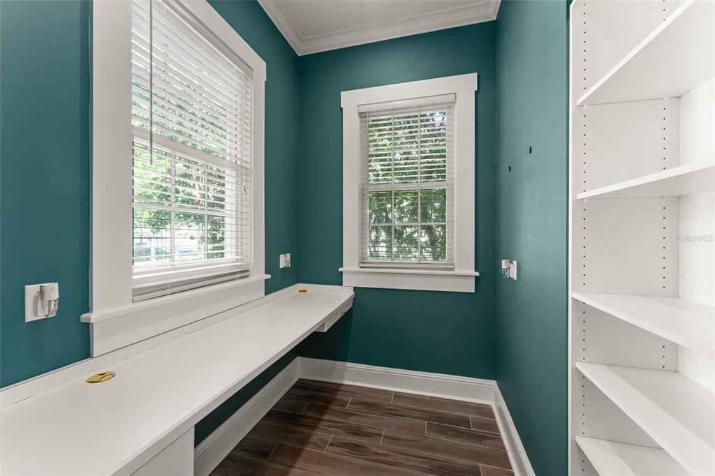 403 Water Street Celebration, FL 34747 - Photo 12 of 86 a room with window and a wooden floor