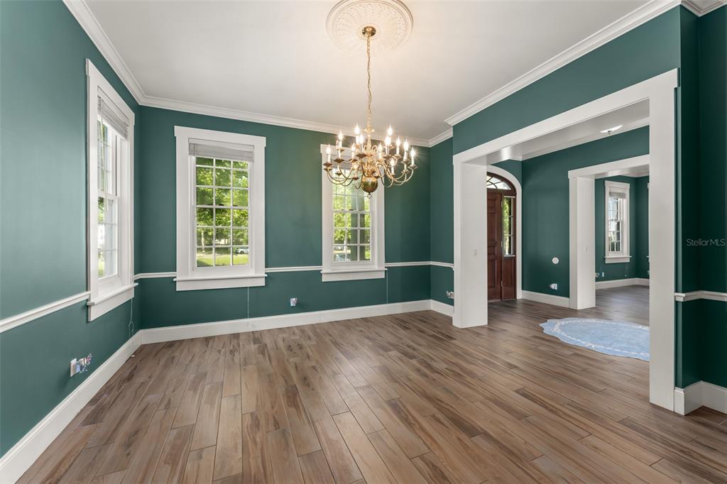 403 Water Street Celebration, FL 34747 - Photo 15 of 86 a view of livingroom with natural light and hardwood floor