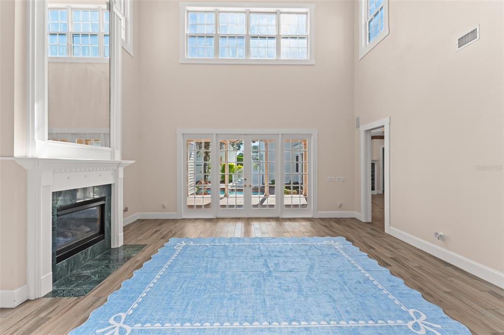 403 Water Street Celebration, FL 34747 - Photo 20 of 86 a view of empty room with a fireplace