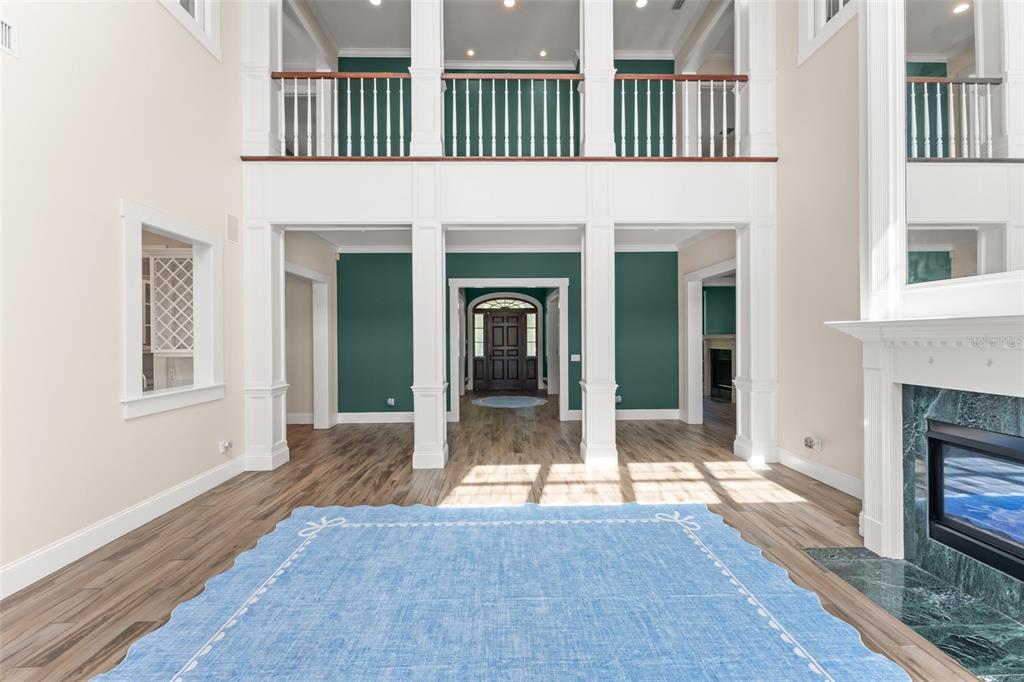 403 Water Street Celebration, FL 34747 - Photo 22 of 86 a view of a livingroom with wooden floor and a fireplace