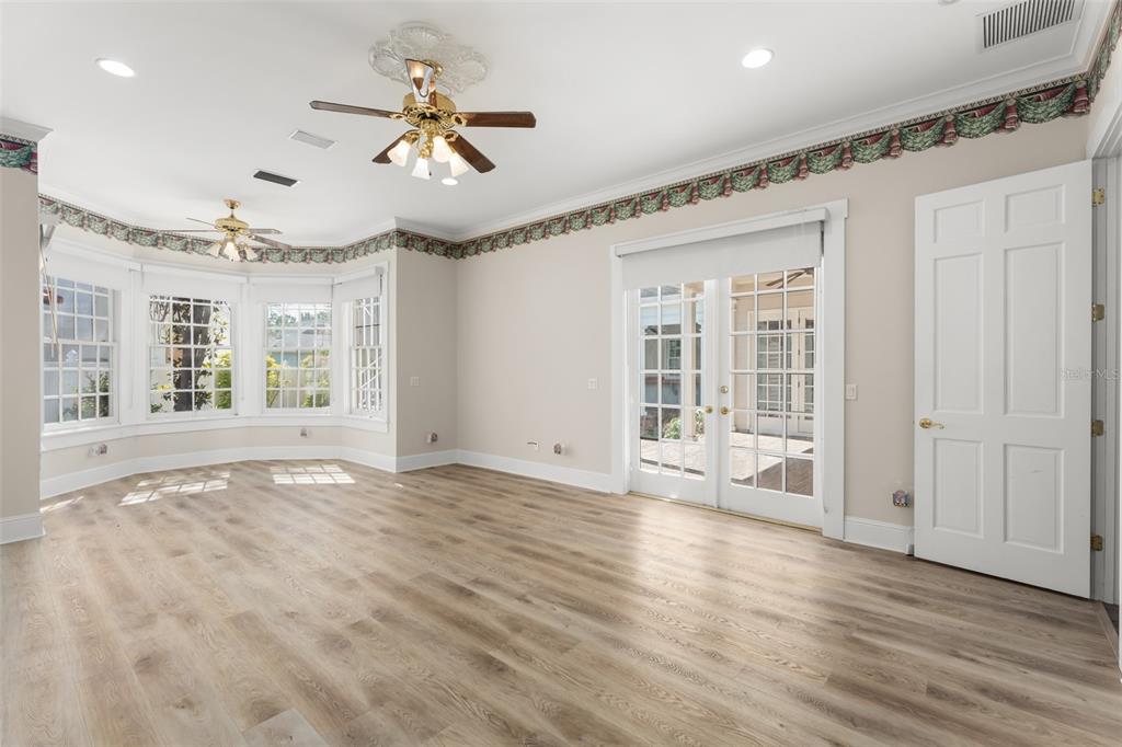403 Water Street Celebration, FL 34747 - Photo 40 of 86 a view of an empty room with a window