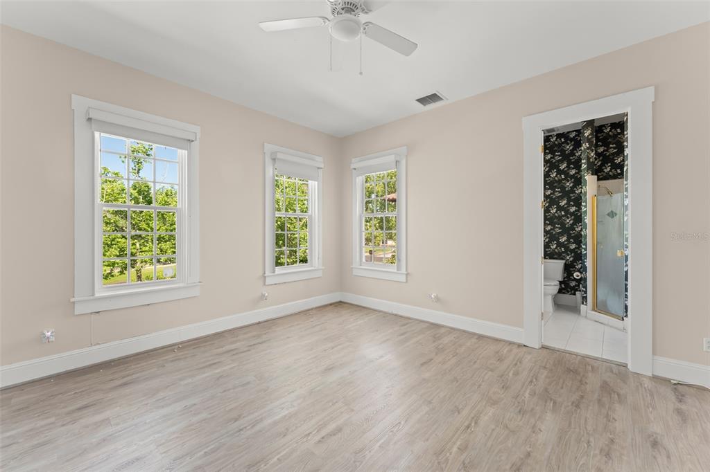 403 Water Street Celebration, FL 34747 - Photo 52 of 86 an empty room with windows and closet