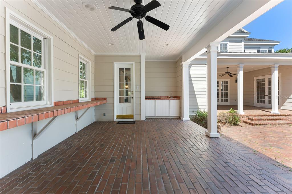 403 Water Street Celebration, FL 34747 - Photo 68 of 86 a view of an entryway with wooden floor and windows