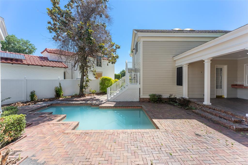 403 Water Street Celebration, FL 34747 - Photo 72 of 86 a view of a backyard with a sitting area