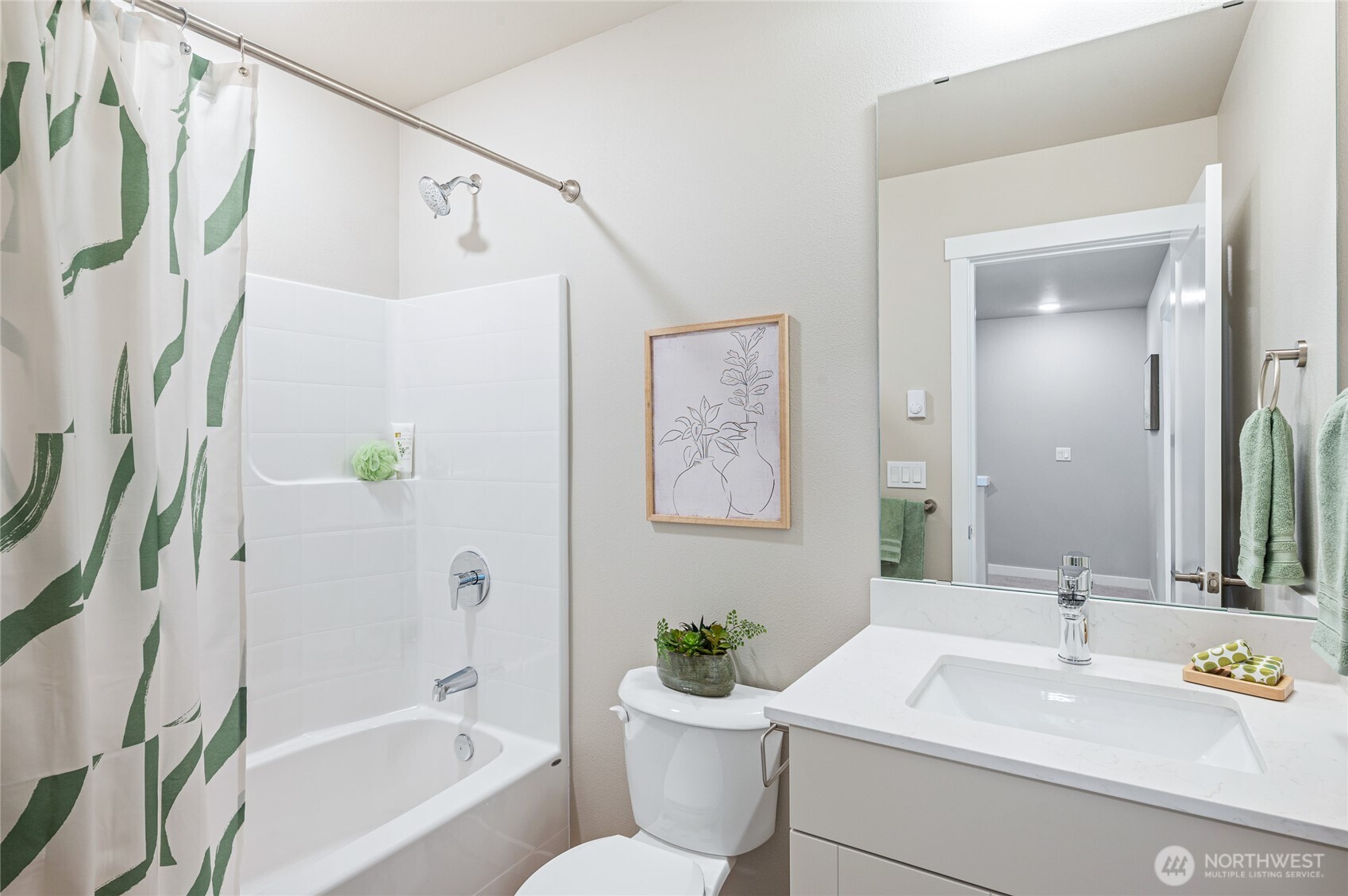 1322 194th Street Southeast, Unit E6 Bothell, WA 98012 - Photo 15 of 17 a bathroom with a sink a toilet and a bathtub