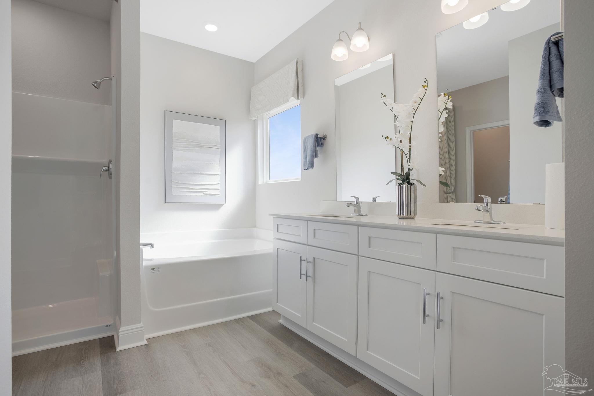 3298 Water Birch Road Cantonment, FL 32533 - Photo 24 of 40 a bathroom with a double vanity sink mirror and double