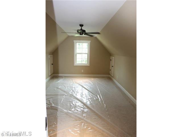 8902 West Pepper Court Oak Ridge, NC 27310 - Photo 14 of 16 Bonus. The Bonus is large and has recessed lighting. There is convenient walk-in attic storage on the second level.