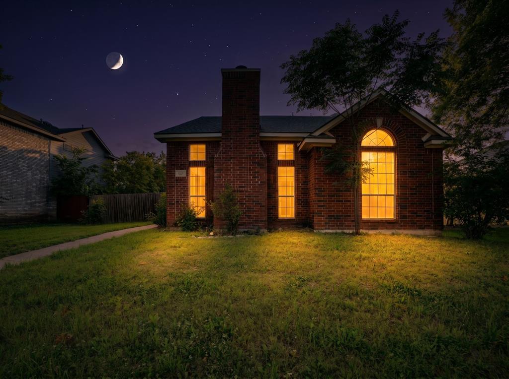 3721 Smartt Street Rowlett, TX 75088 - Photo 27 of 27 a house with trees in the background
