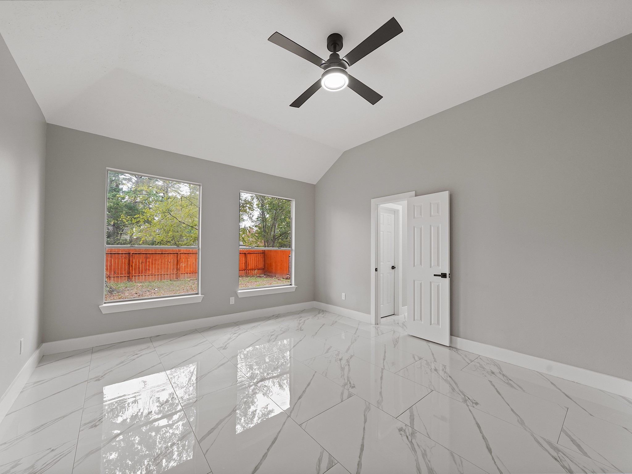 25007 Butterwick Drive Spring, TX 77389 - Photo 13 of 22 a view of an empty room with a window
