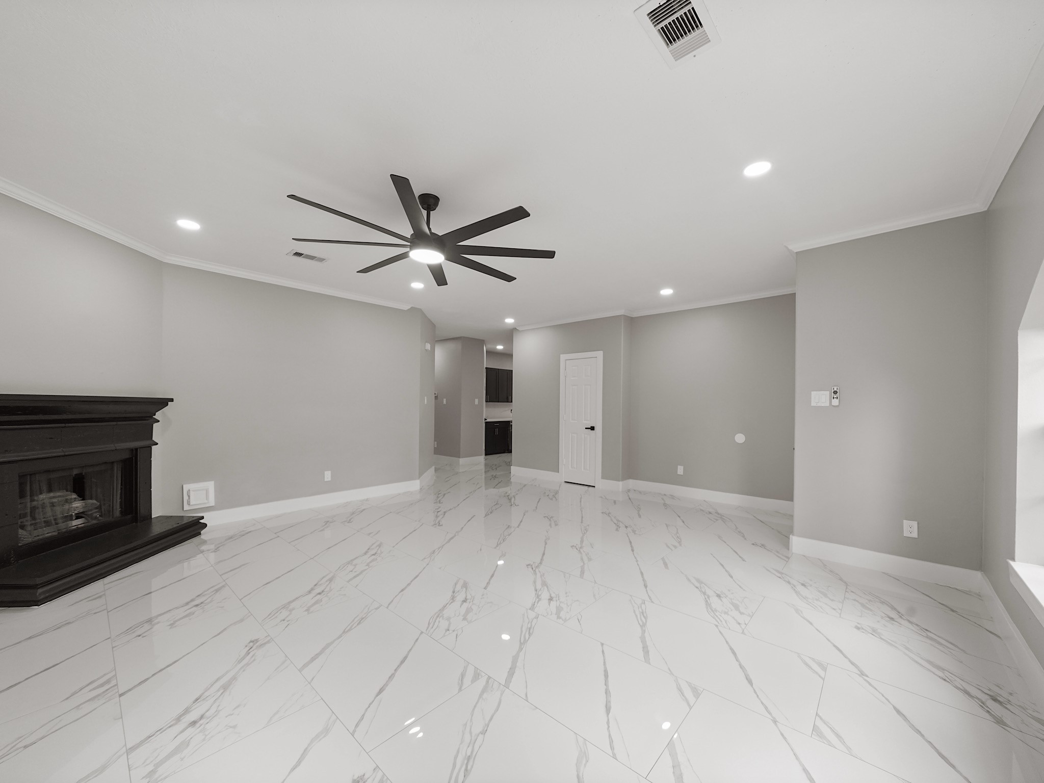 25007 Butterwick Drive Spring, TX 77389 - Photo 4 of 22 a view of an empty room with a fireplace