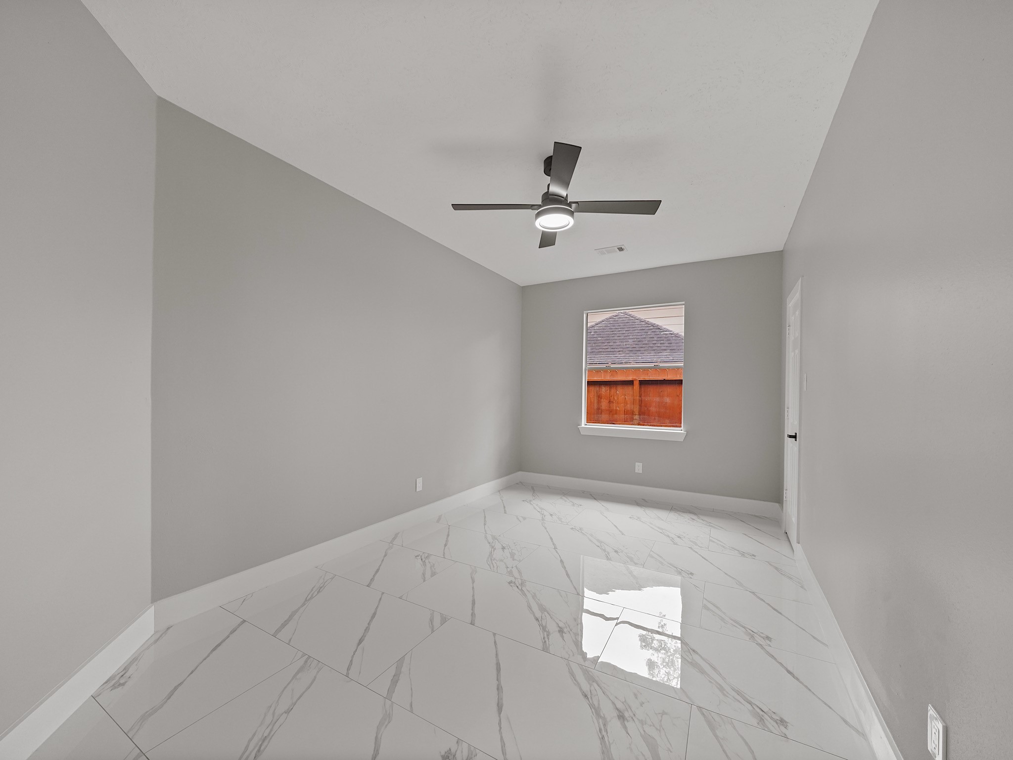 25007 Butterwick Drive Spring, TX 77389 - Photo 10 of 22 a view of an empty room with a window