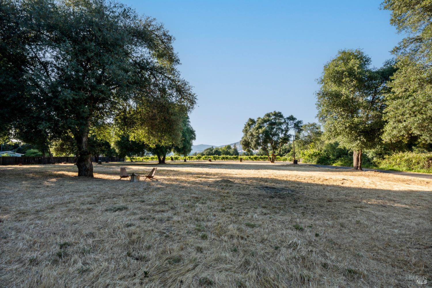 3301 Rd B Redwood Valley, CA 95470 - Photo 6 of 11 a view of a house with large trees