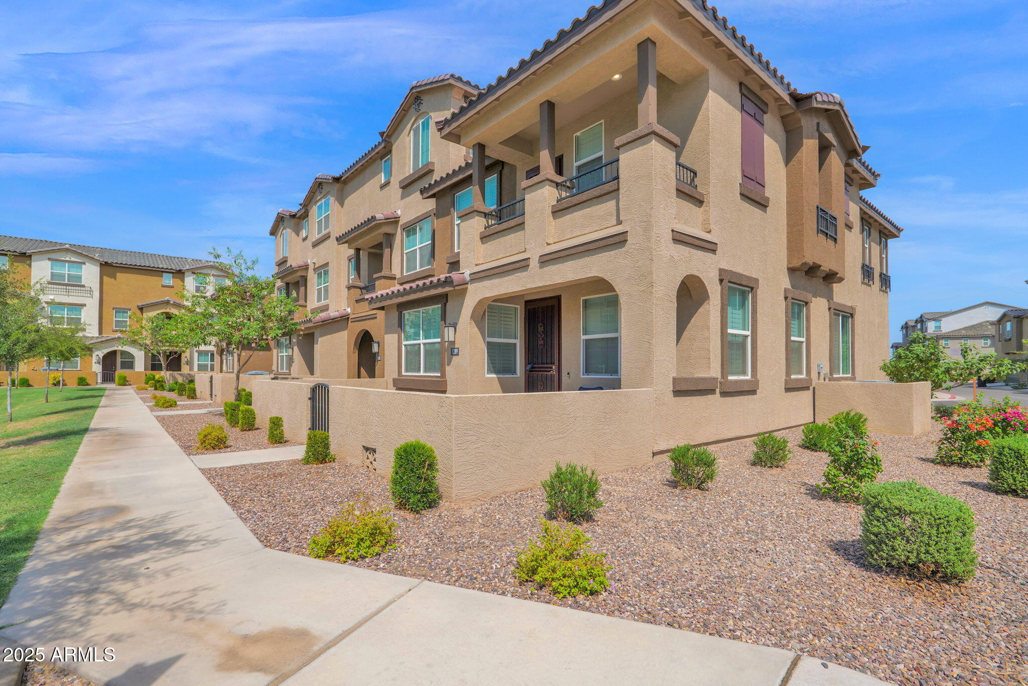1255 North Arizona Avenue, Unit 1289 Chandler, AZ 85225 - Photo 1 of 32 a view of a building with a street