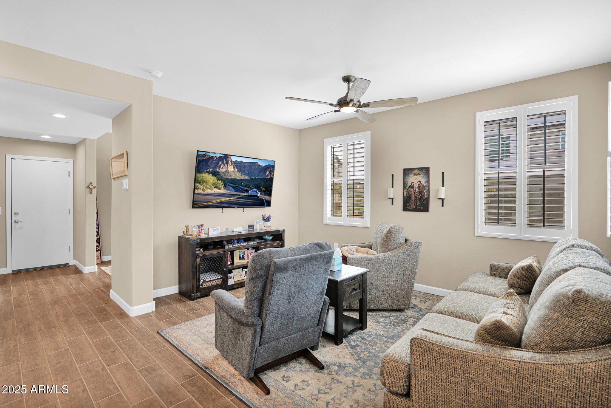 1255 North Arizona Avenue, Unit 1289 Chandler, AZ 85225 - Photo 13 of 32 a living room with fireplace furniture and a flat screen tv