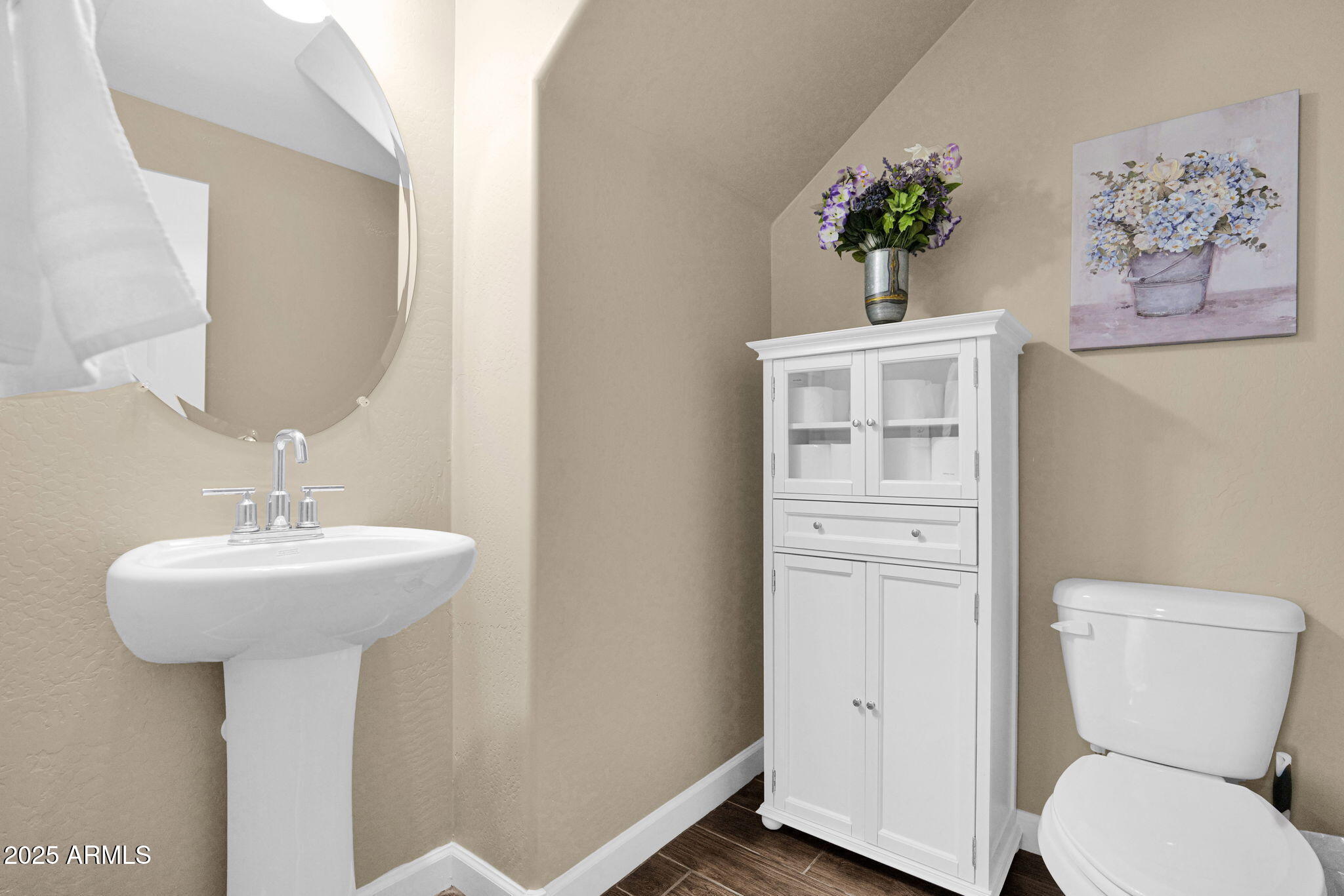 1255 North Arizona Avenue, Unit 1289 Chandler, AZ 85225 - Photo 14 of 32 a bathroom with a toilet sink and mirror