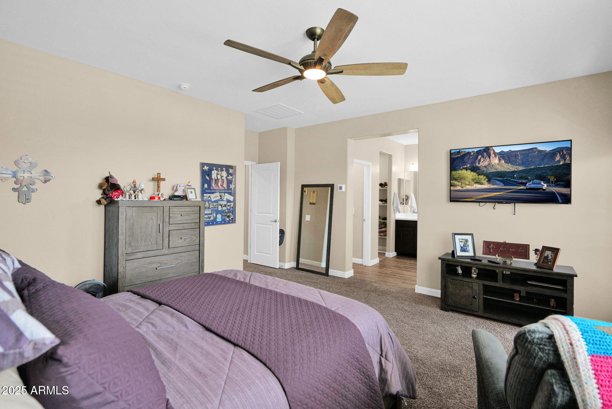 1255 North Arizona Avenue, Unit 1289 Chandler, AZ 85225 - Photo 16 of 32 a bedroom with a bed and dresser
