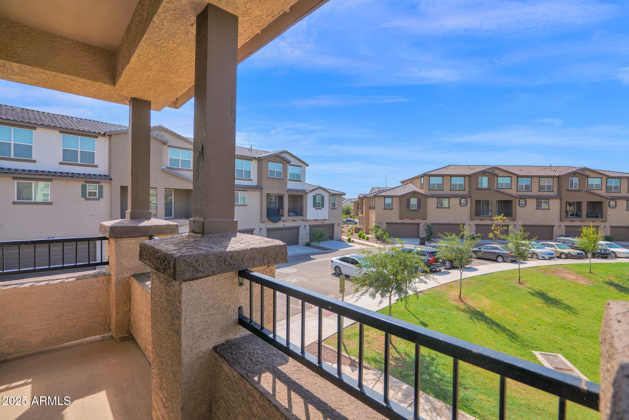 1255 North Arizona Avenue, Unit 1289 Chandler, AZ 85225 - Photo 20 of 32 a view of a city from a balcony