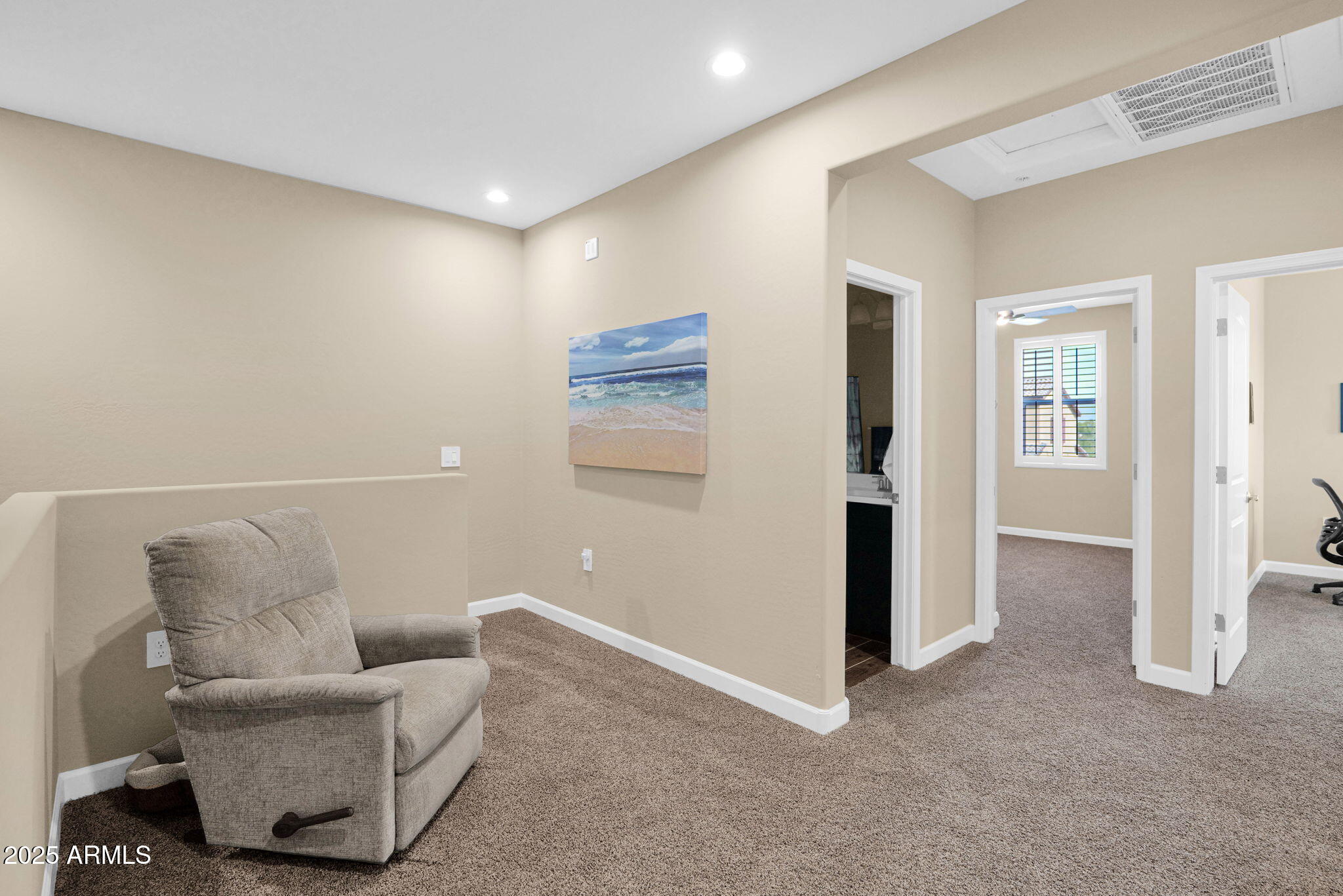 1255 North Arizona Avenue, Unit 1289 Chandler, AZ 85225 - Photo 22 of 32 a living room with furniture and a rug