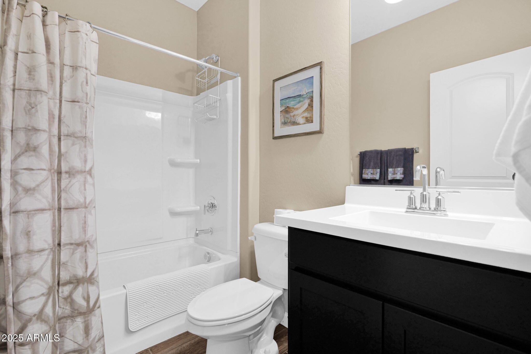 1255 North Arizona Avenue, Unit 1289 Chandler, AZ 85225 - Photo 23 of 32 a bathroom with a sink a toilet and shower