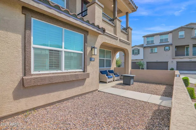 a view of a building with sitting area