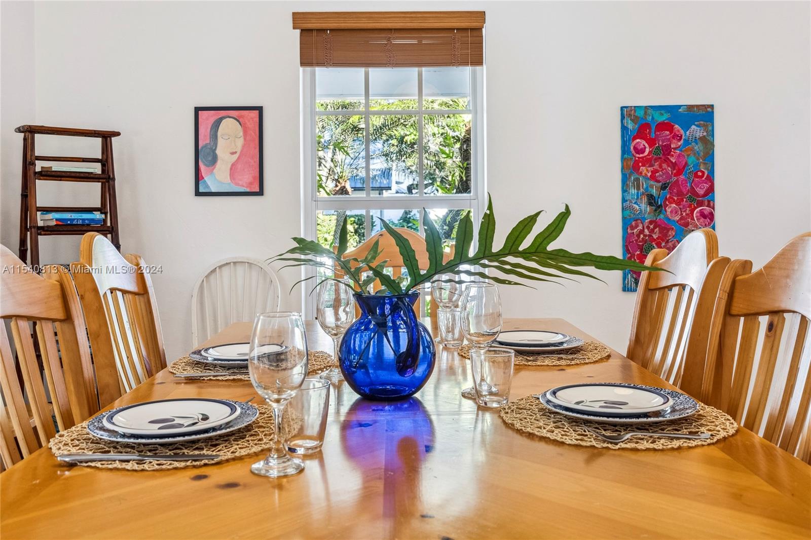 10130 Southwest 70th Avenue Pinecrest, FL 33156 - Photo 13 of 75 a bathroom with a toilet a sink and a large mirror