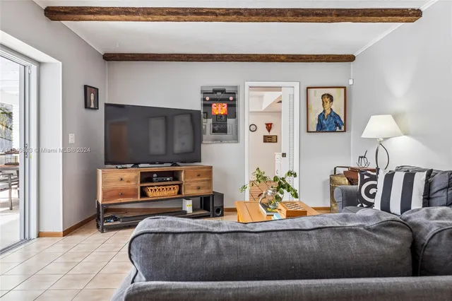 a bathroom with a sink a mirror and a shower