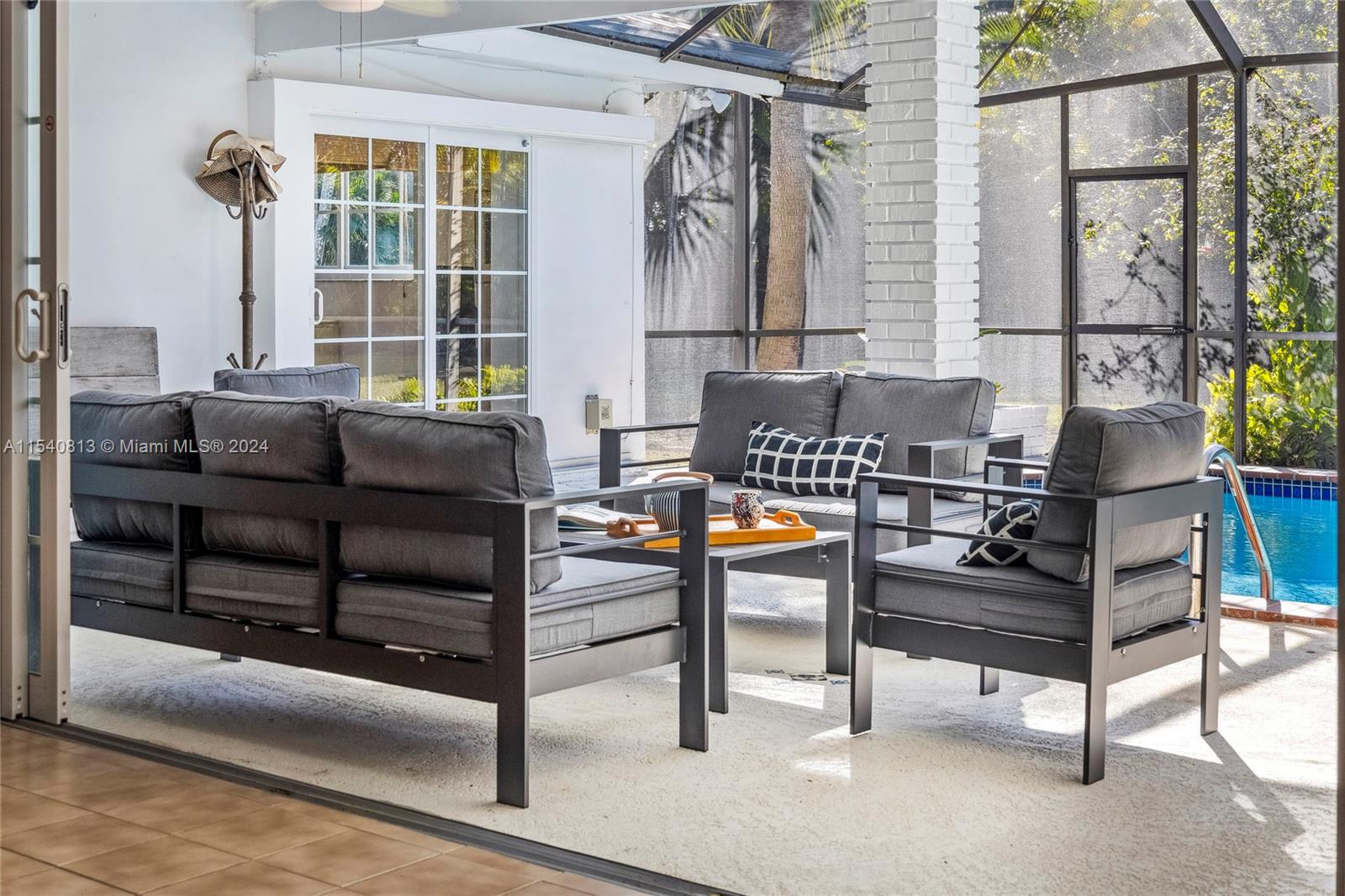10130 Southwest 70th Avenue Pinecrest, FL 33156 - Photo 51 of 75 a living room with furniture