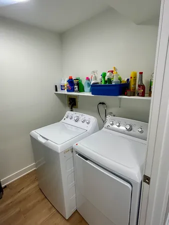a utility room with dryer and washer