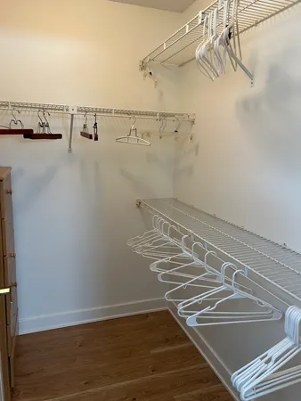a view of a room with racks on the wall