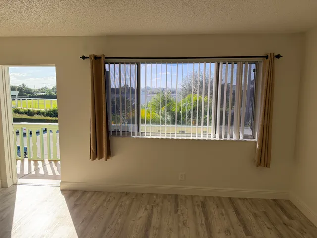 $86,000 | 400 Village Green Circle West, Unit 304, Palm Springs, FL 33461