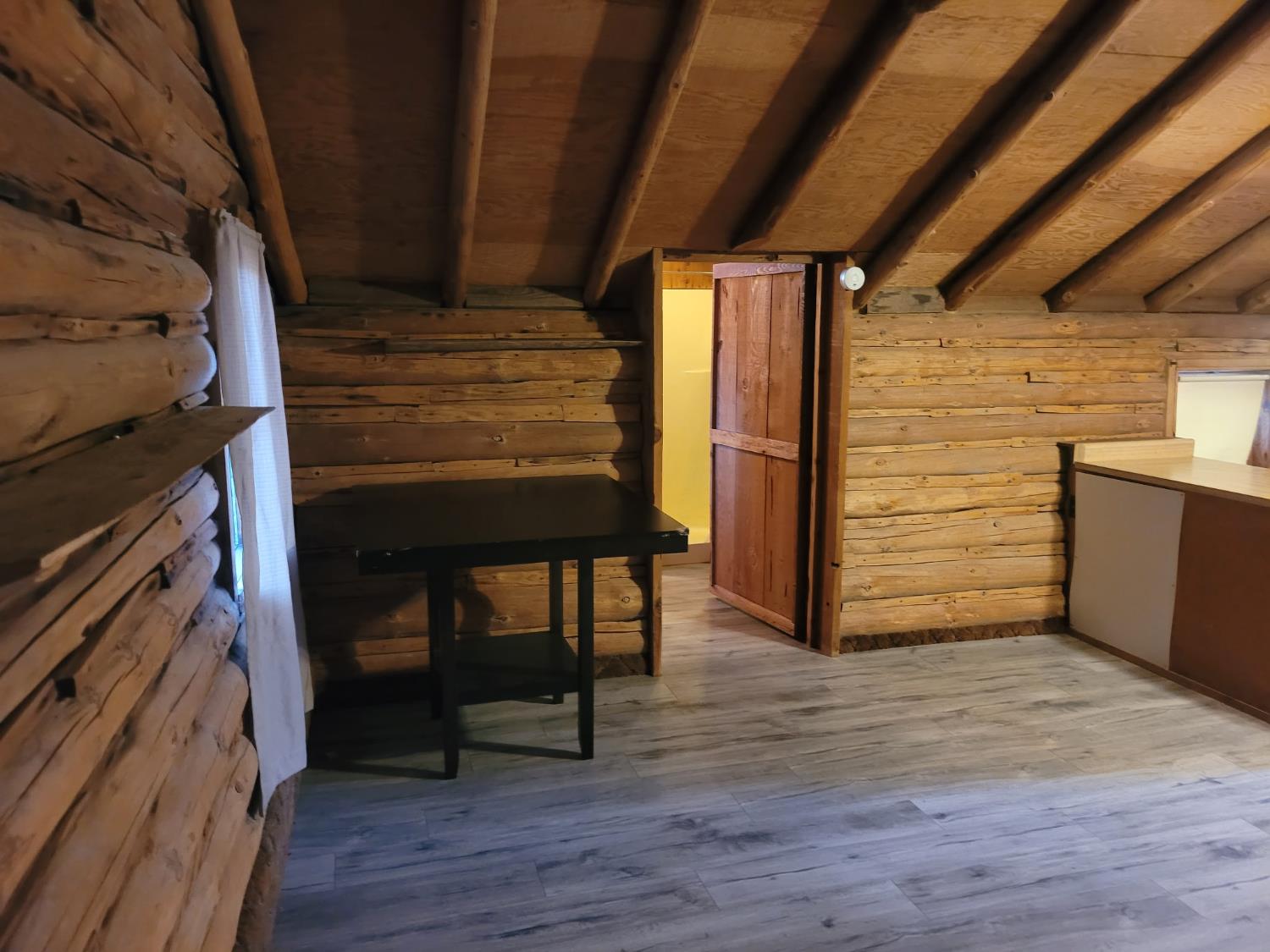 1550 Copperton Road Camino, CA 95709 - Photo 16 of 22 a view of room with wooden floor