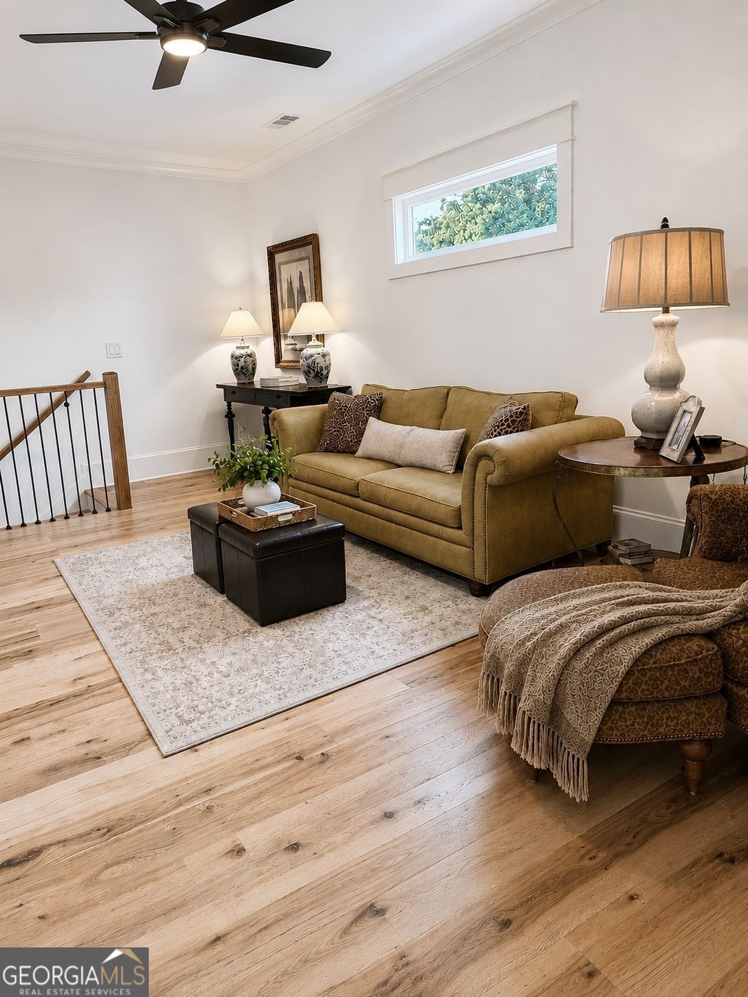913 Indigo Bunting Road Statham, GA 30666 - Photo 21 of 31 a bedroom with furniture and a wooden floor