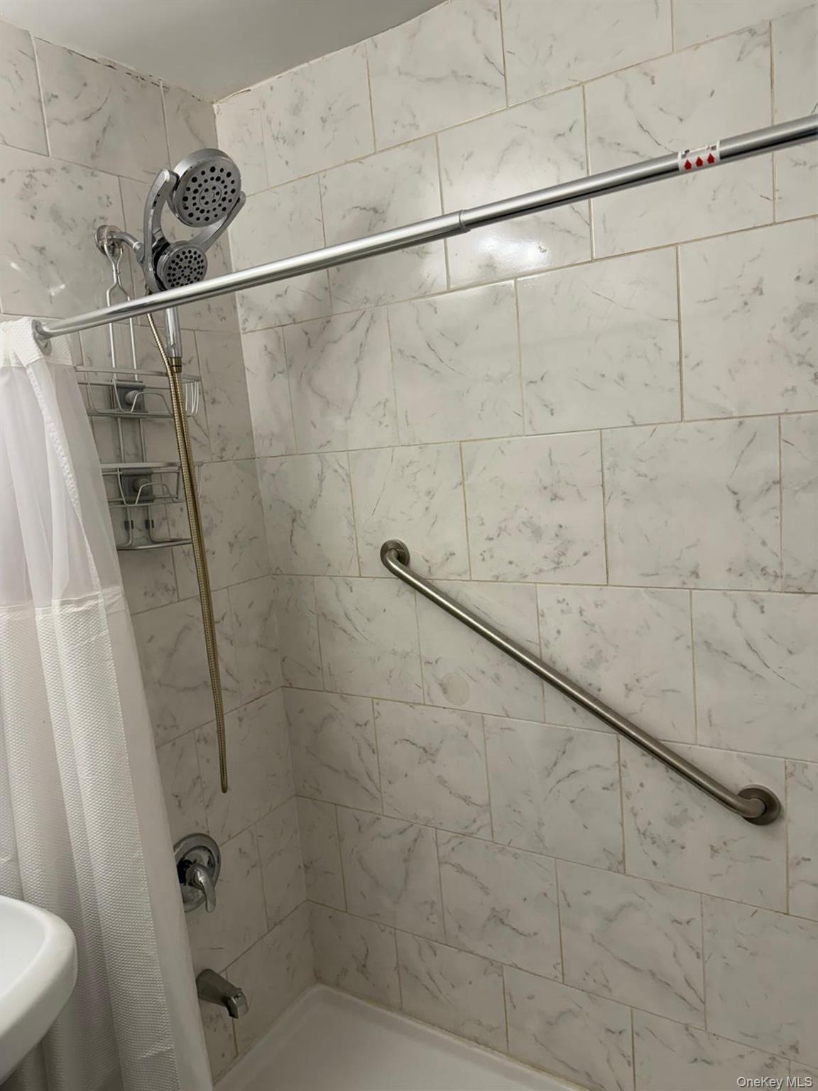 3520 Tryon Avenue, Unit 405 Bronx, NY 10467 - Photo 13 of 22 a bathroom with a shower