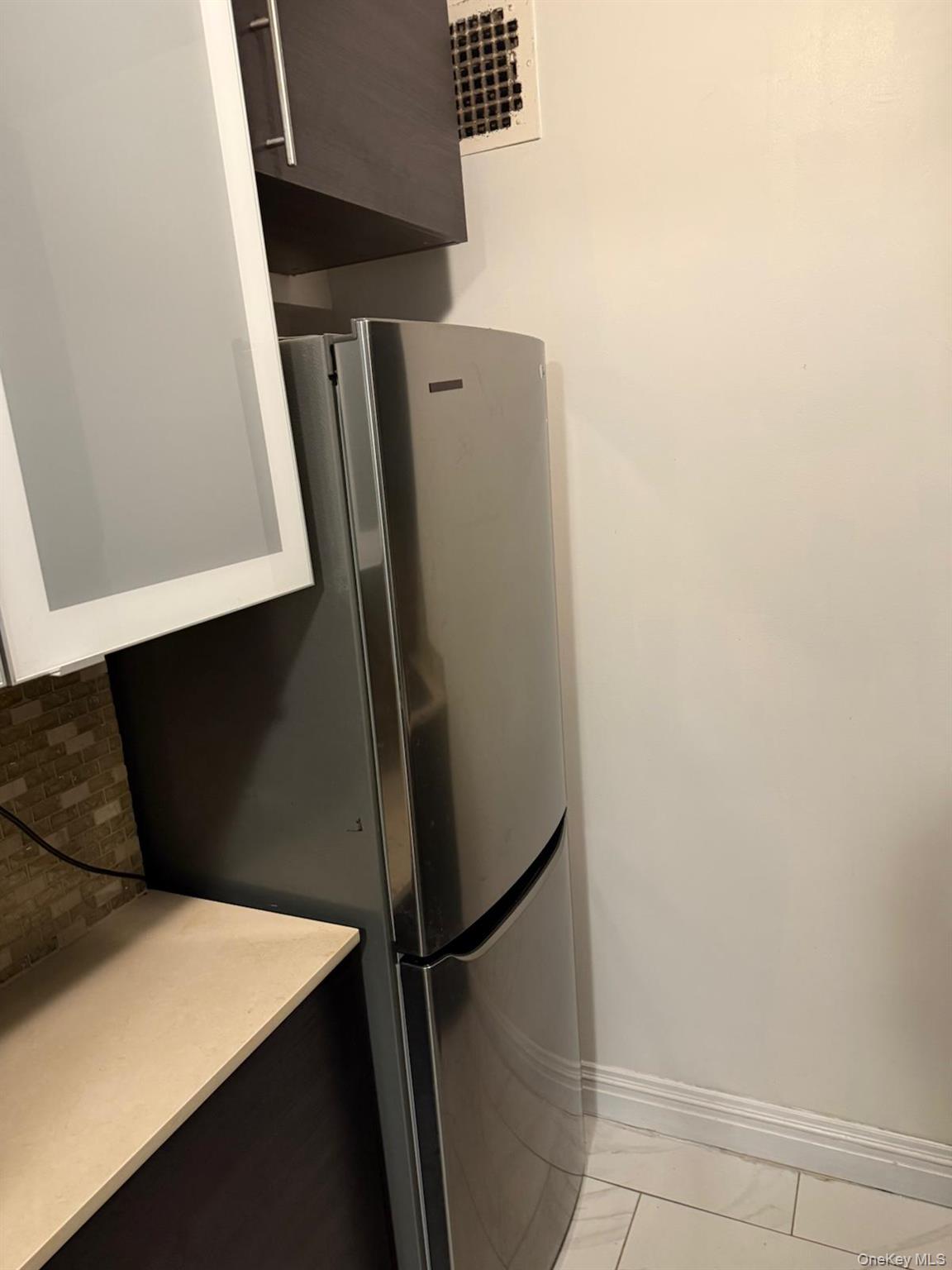 3520 Tryon Avenue, Unit 405 Bronx, NY 10467 - Photo 16 of 22 a close view of cabinet