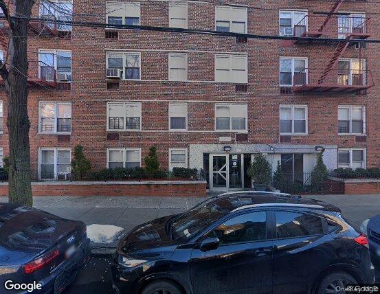 3520 Tryon Avenue, Unit 405 Bronx, NY 10467 - Photo 2 of 22 a car parked in front of a brick building