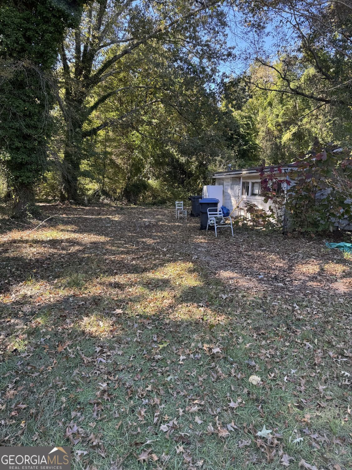 1773 East Atlanta Road Stockbridge, GA 30281 - Photo 8 of 13 a backyard of a house with table and chairs