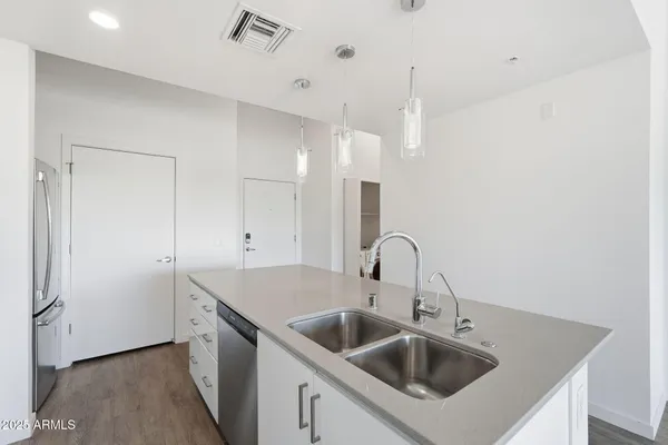 a kitchen with a stove and a microwave