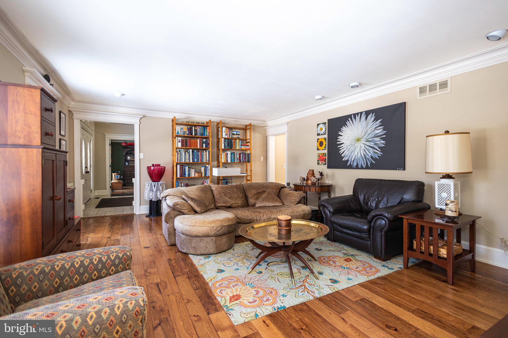 196 Aqueduct Road Washington Crossing, PA 18977 - Photo 11 of 57 a living room with furniture and a lamp