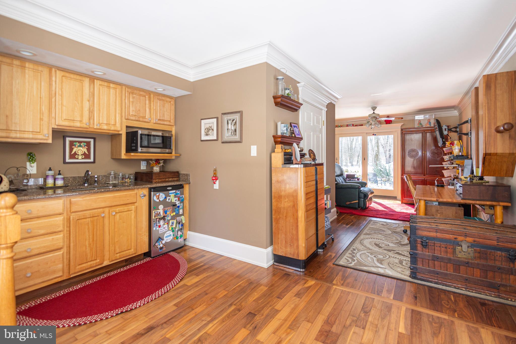 196 Aqueduct Road Washington Crossing, PA 18977 - Photo 12 of 57 a kitchen with stainless steel appliances granite countertop a stove a sink and a refrigerator