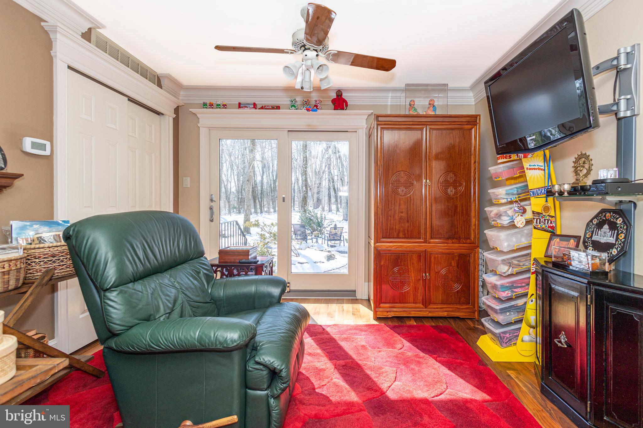 196 Aqueduct Road Washington Crossing, PA 18977 - Photo 14 of 57 a living room with furniture and a flat screen tv