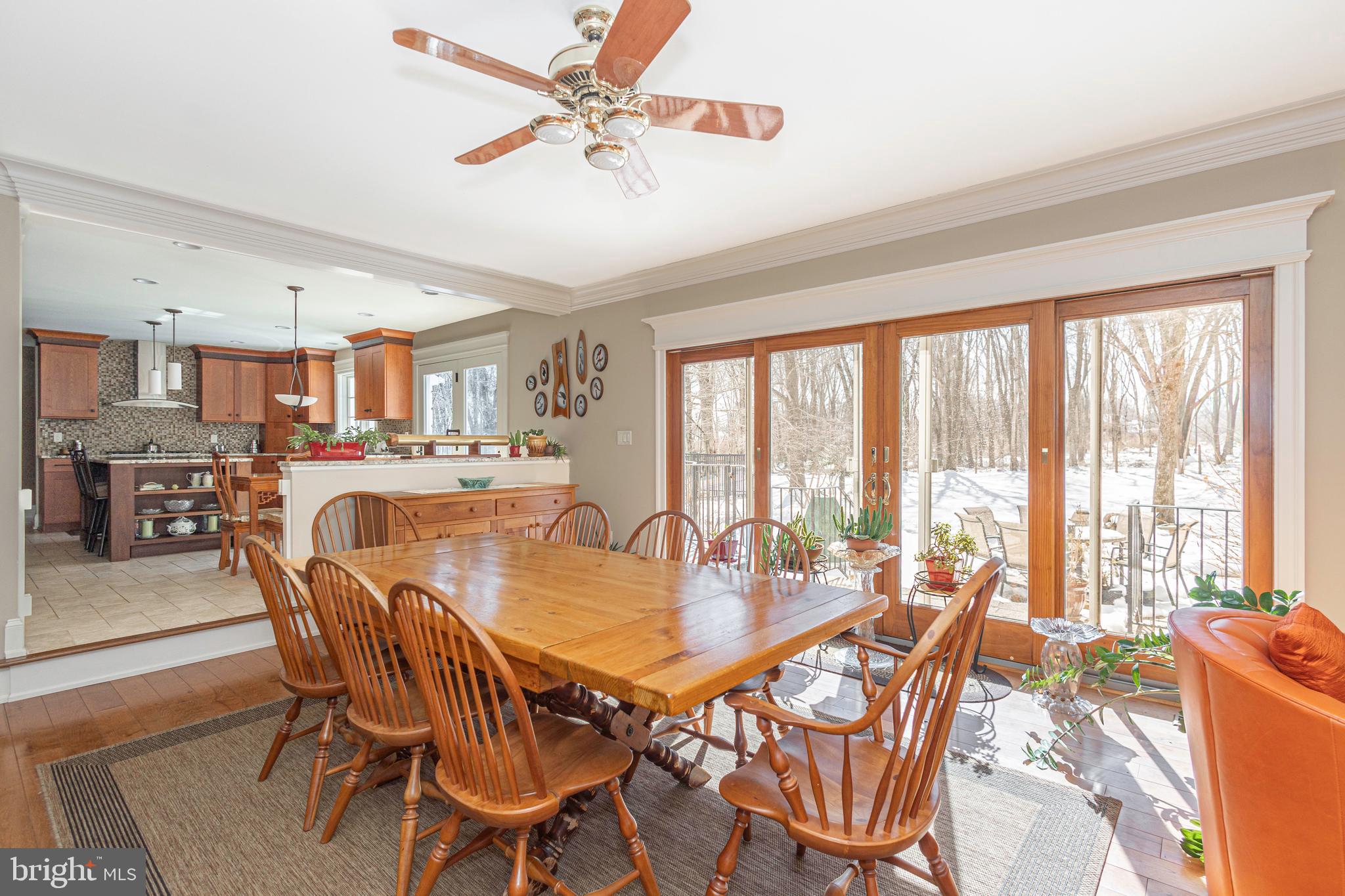 196 Aqueduct Road Washington Crossing, PA 18977 - Photo 24 of 57 a view of a dining room and livingroom with furniture window and wooden floor